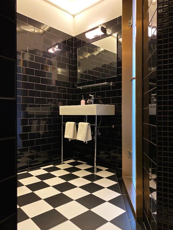 Koupelna v ubytování Hotel Rumor