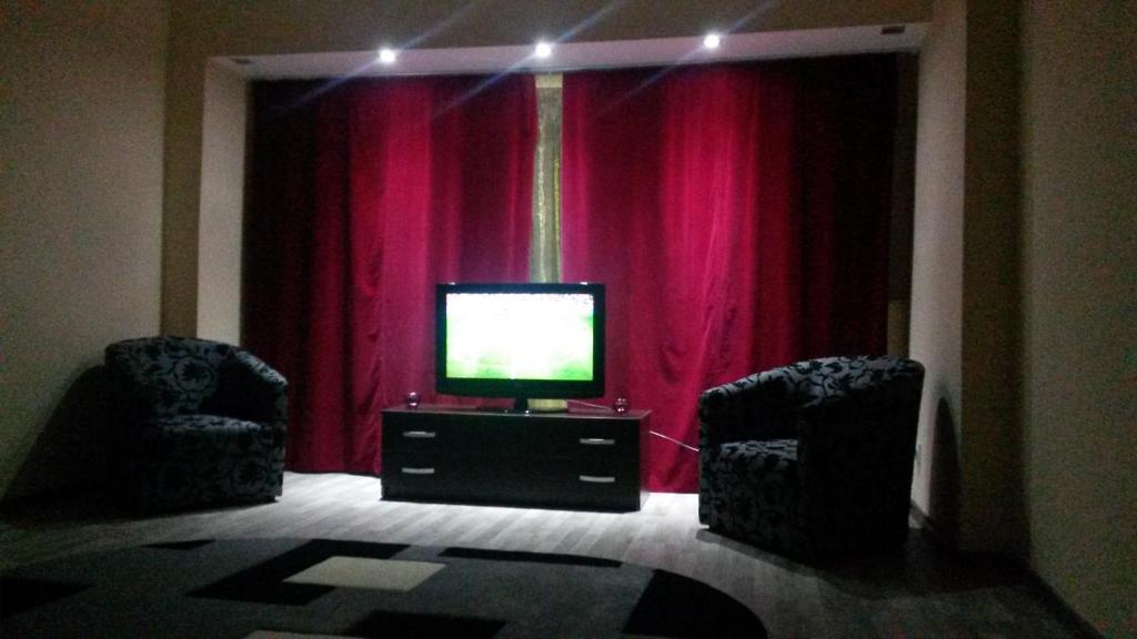 A television and/or entertainment centre at Ambiance Center