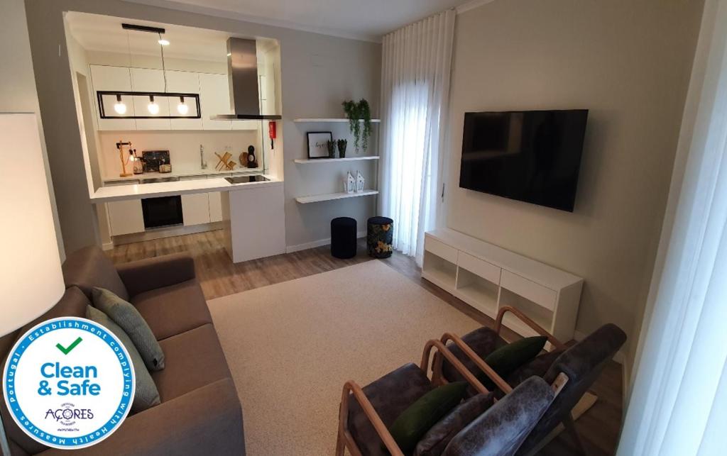 TV a/nebo společenská místnost v ubytování Apartamento Lagoa