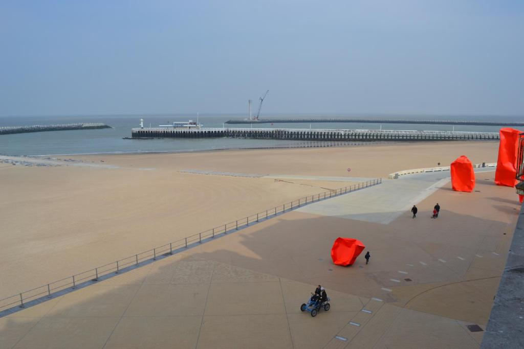 an aerial view of a beach with a pier at Studio 24 Oostende in Ostend