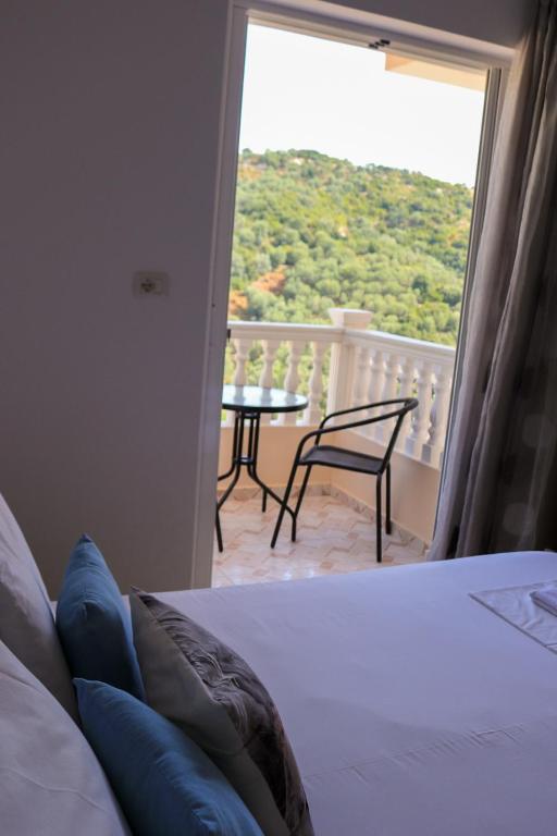 Postel nebo postele na pokoji v ubytování Lumra Rooms