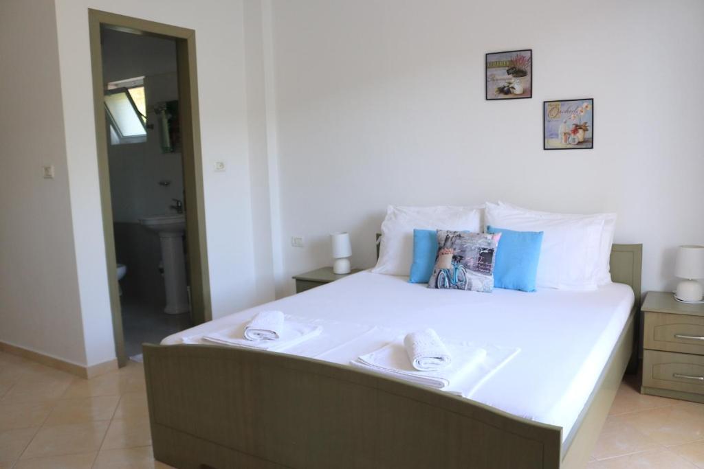 Postel nebo postele na pokoji v ubytování Lumra Rooms