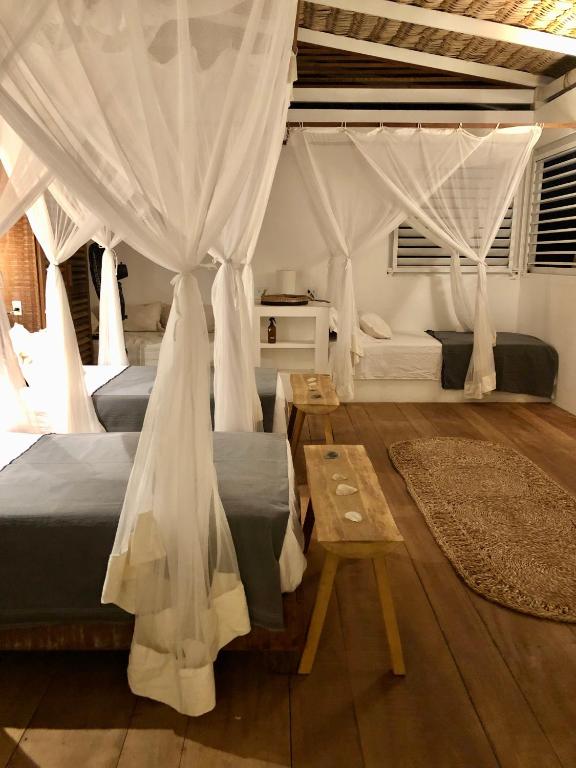 Voodi või voodid majutusasutuse Limbo Atins Chalets - Lençóis Maranhenses toas