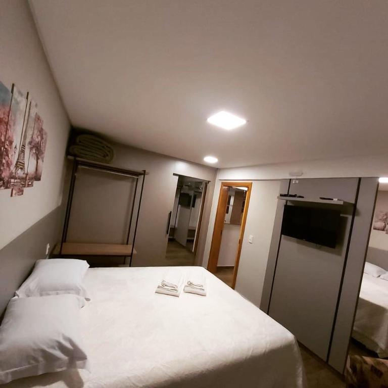 Postel nebo postele na pokoji v ubytování CasAlta Pousada