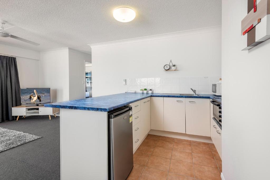 Kuchyň nebo kuchyňský kout v ubytování Belaire Place Motel Apartments