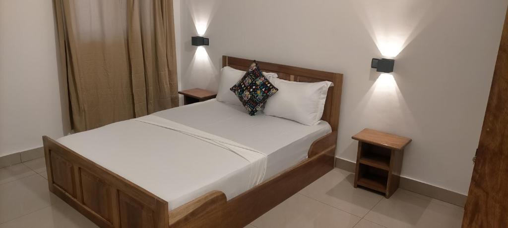 Postel nebo postele na pokoji v ubytování AZURIA HOTEL