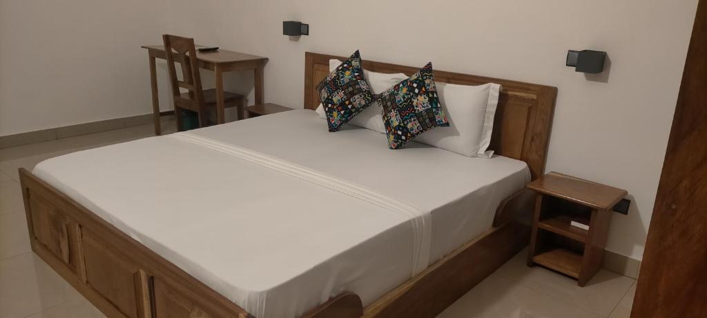 Postel nebo postele na pokoji v ubytování AZURIA HOTEL