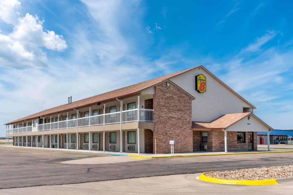 a hotel exterior with a building at Super 8 by Wyndham Goodland in Goodland