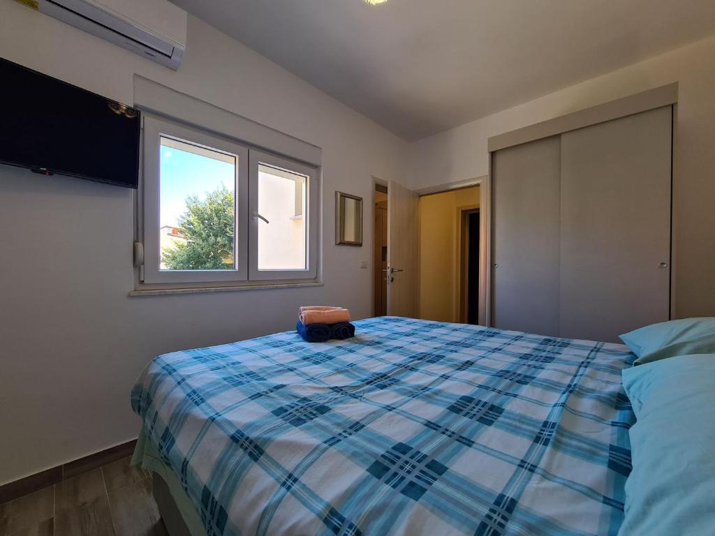 Łóżko lub łóżka w pokoju w obiekcie House Plavi 2130