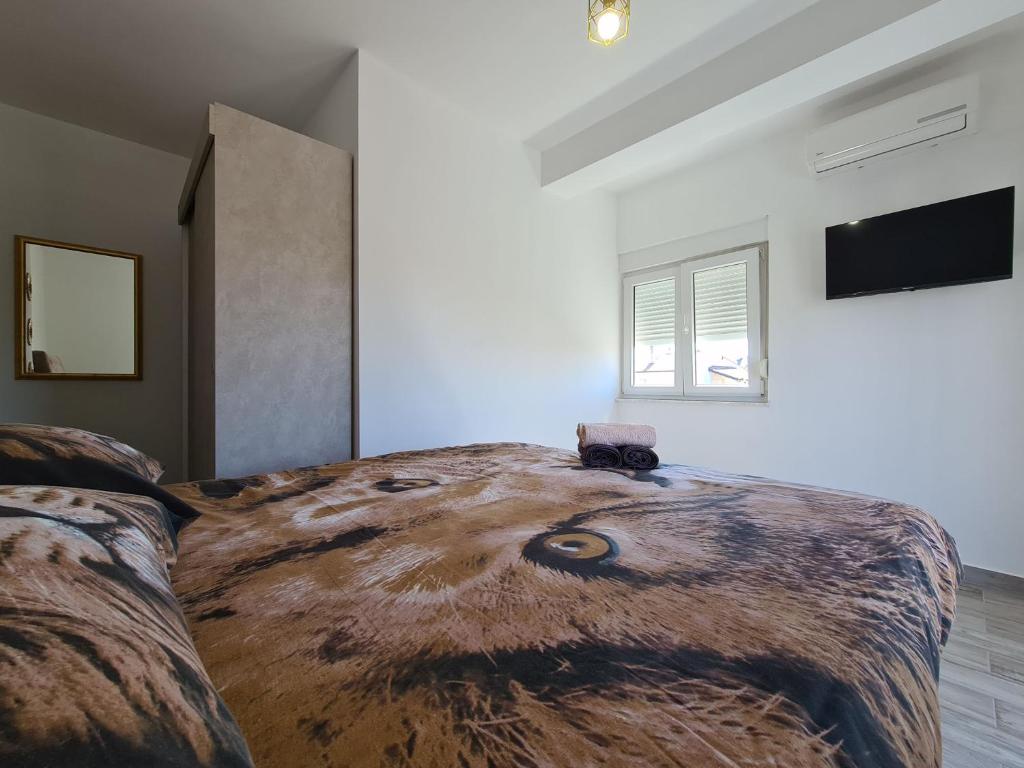 Łóżko lub łóżka w pokoju w obiekcie House Plavi 2130