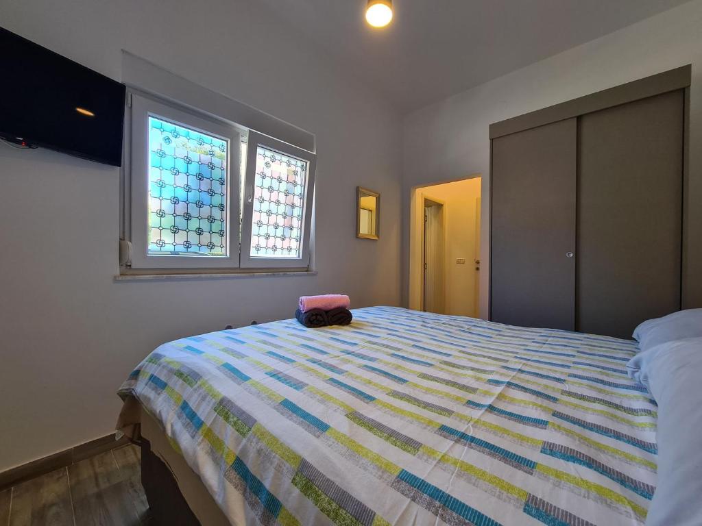 Łóżko lub łóżka w pokoju w obiekcie House Plavi 2130