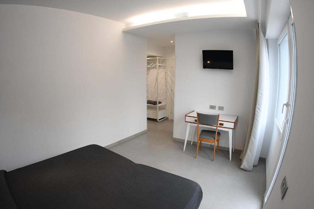 TV a/nebo společenská místnost v ubytování Golden Beach Residence