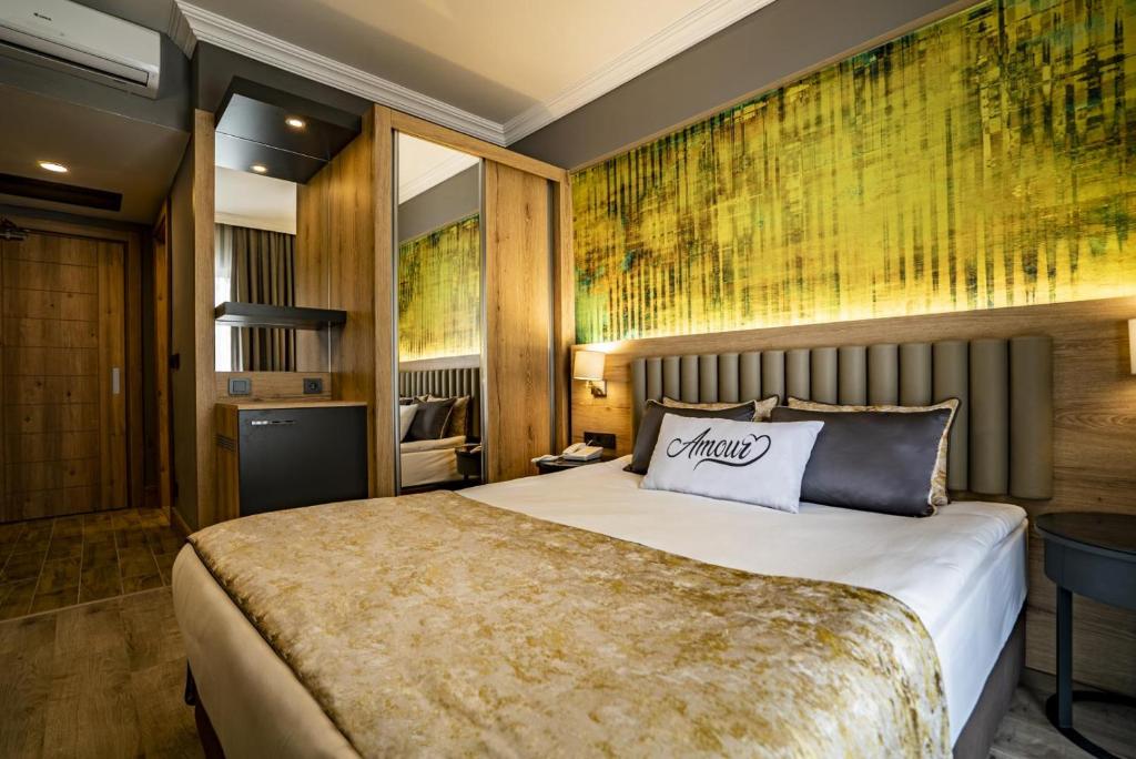 Postel nebo postele na pokoji v ubytování Side Amour Hotel