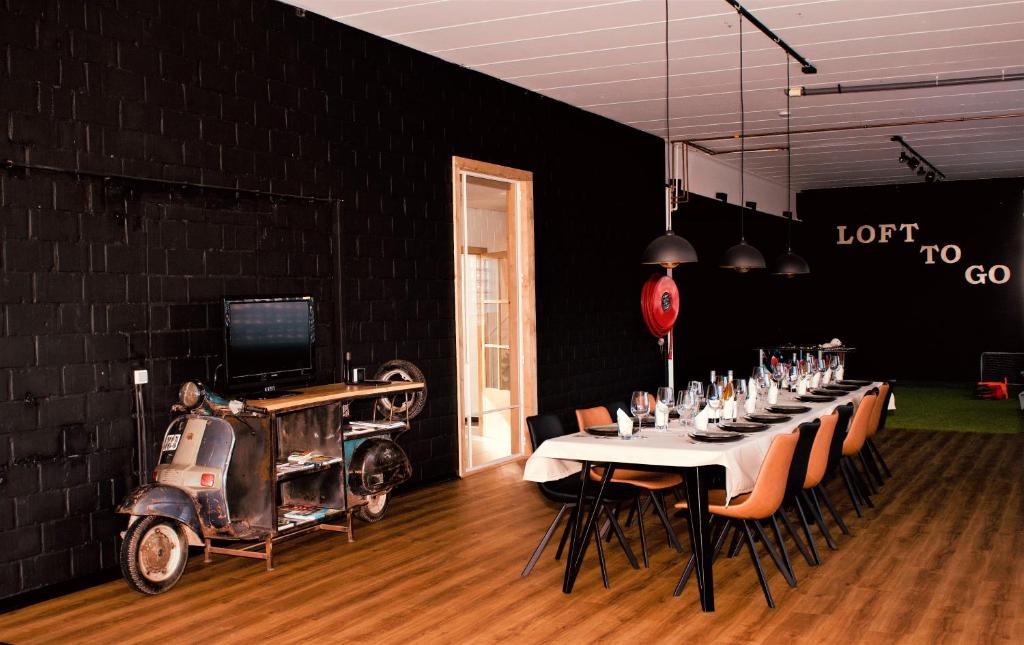 TV a/nebo společenská místnost v ubytování Loft to go