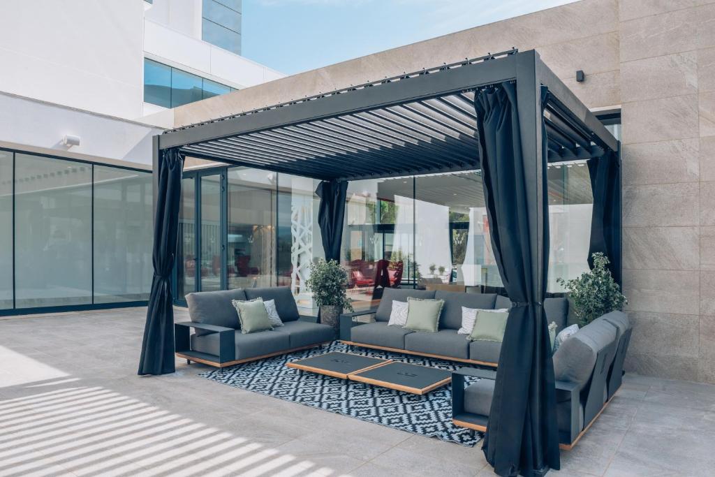 Uma área de estar em Iberostar Waves Cala Millor - Adults Only