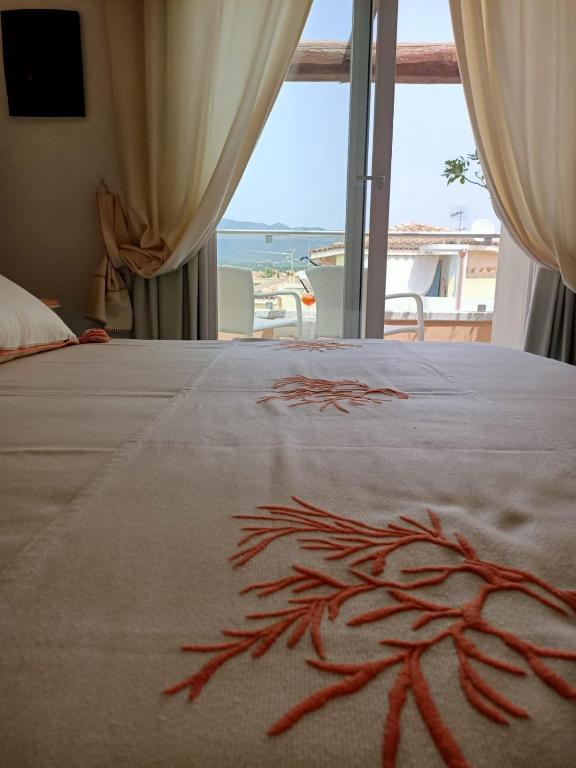 Posteľ alebo postele v izbe v ubytovaní Janas Hotel