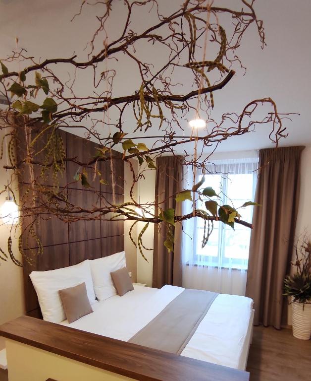 Postel nebo postele na pokoji v ubytování Apartmány Na Vyhlídce