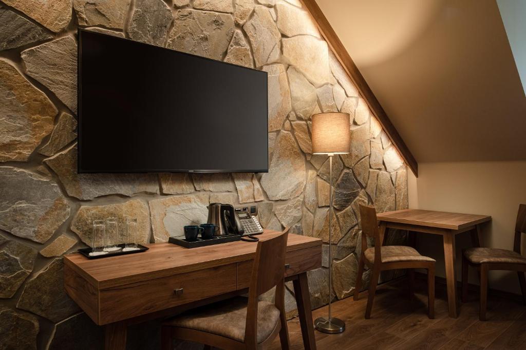 TV a/nebo společenská místnost v ubytování Resort Sobotín