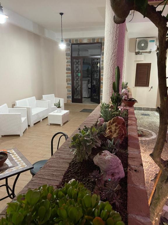 Postel nebo postele na pokoji v ubytování INFORMIS B&B