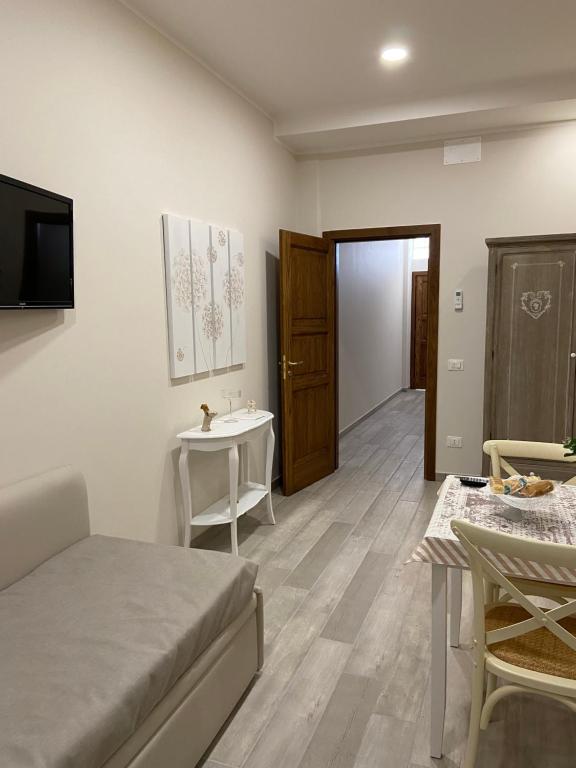 TV a/nebo společenská místnost v ubytování INFORMIS B&B