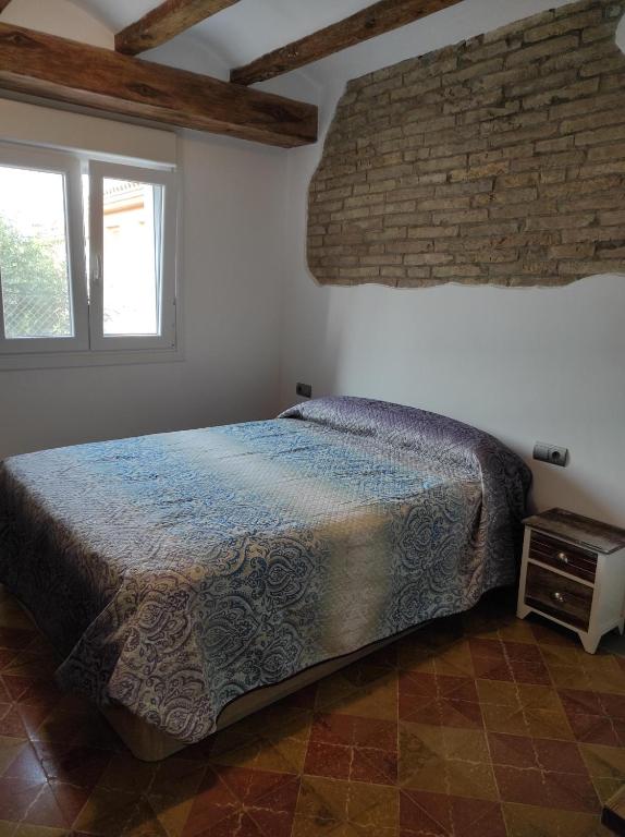 Postel nebo postele na pokoji v ubytování Casa Rural MESTRE
