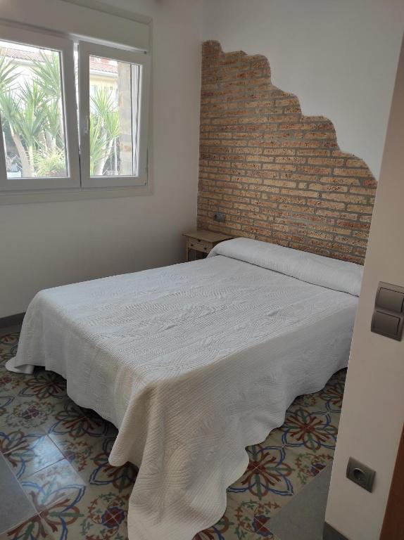 Postel nebo postele na pokoji v ubytování Casa Rural MESTRE