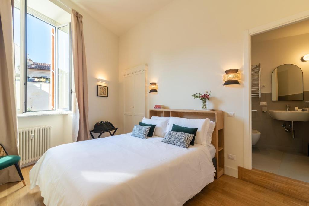 Postel nebo postele na pokoji v ubytování Relais Virgilio