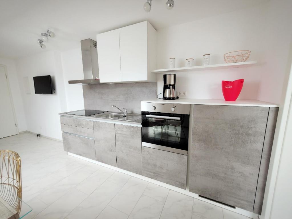 Kuchyň nebo kuchyňský kout v ubytování Stengels Sekt Appartements