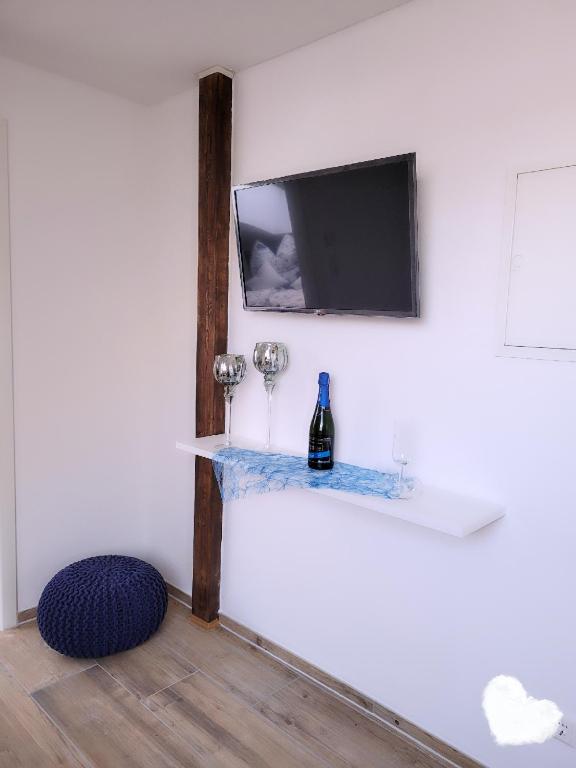 TV a/nebo společenská místnost v ubytování Stengels Sekt Appartements