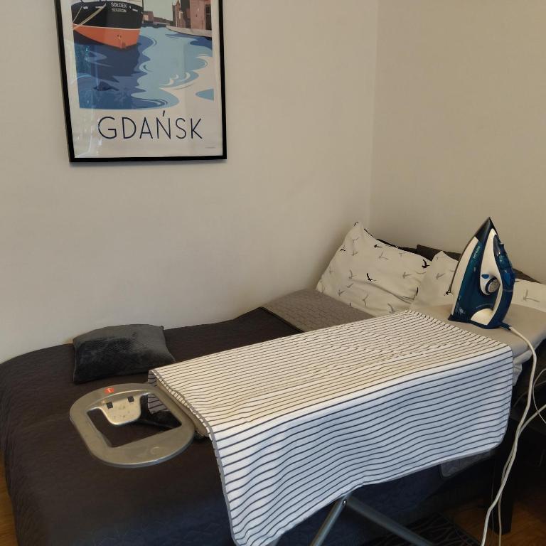 Postel nebo postele na pokoji v ubytování Zielona Kamienica Gdańsk