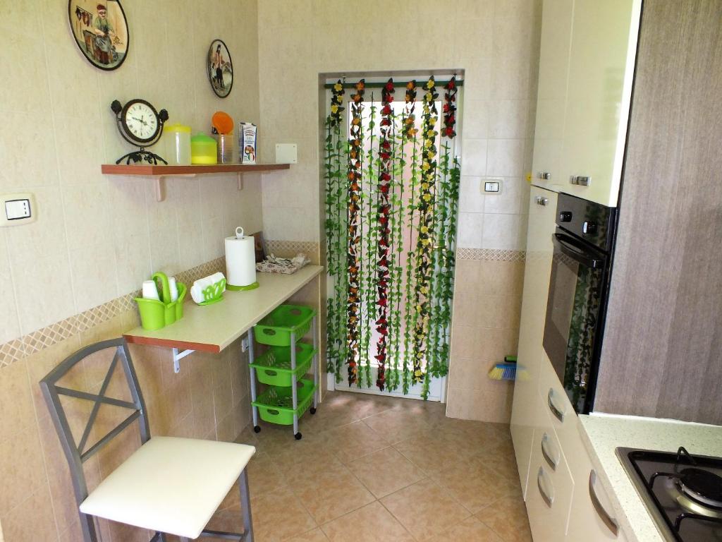 Kuchyň nebo kuchyňský kout v ubytování Casa Fronte Mare