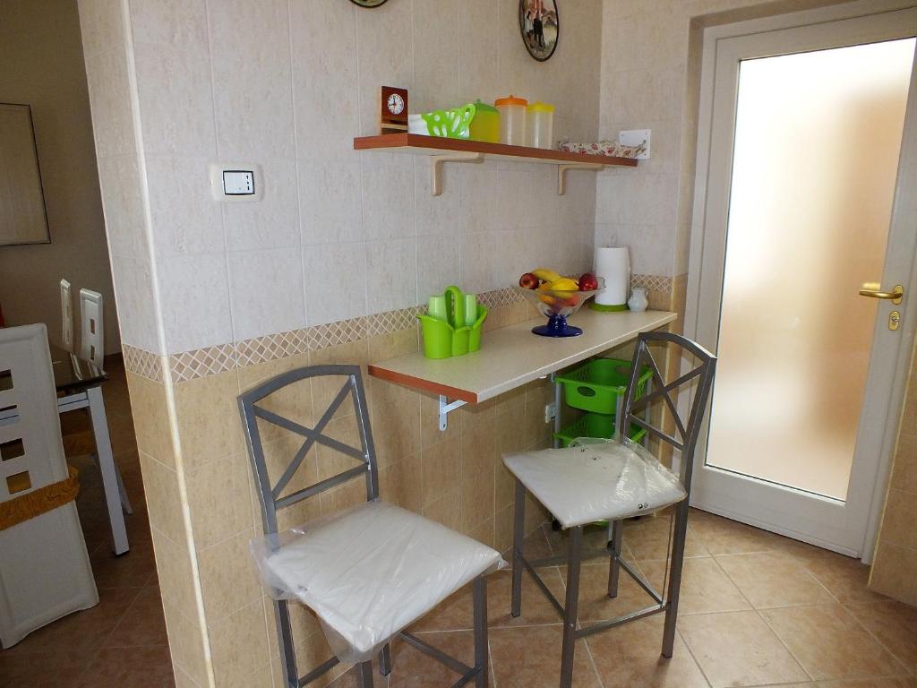 Kuchyň nebo kuchyňský kout v ubytování Casa Fronte Mare