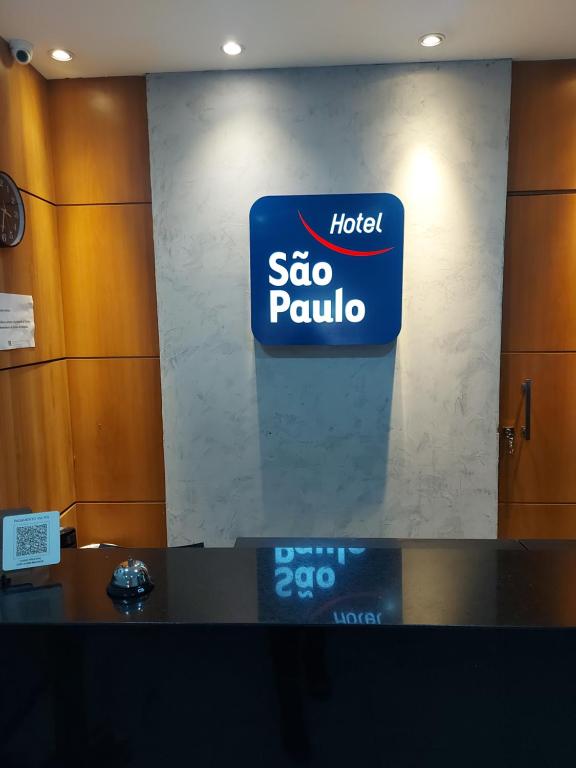 a sign for a spa paulula on a wall at HSP - HOTEL SÃO PAULO in Barra Mansa