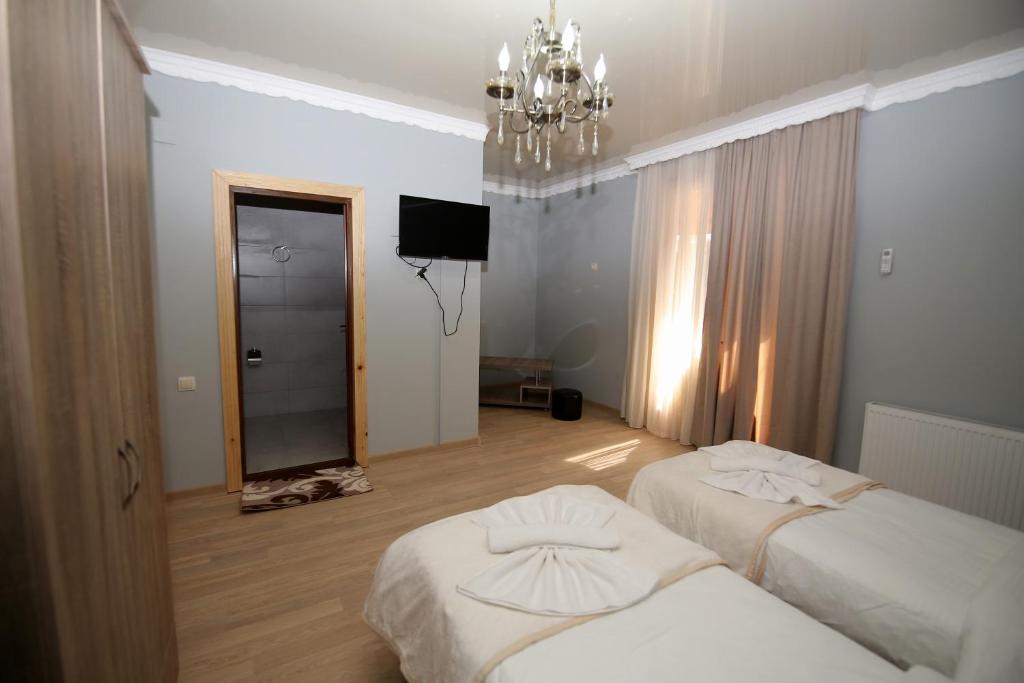 Postel nebo postele na pokoji v ubytování Hotel Shogi