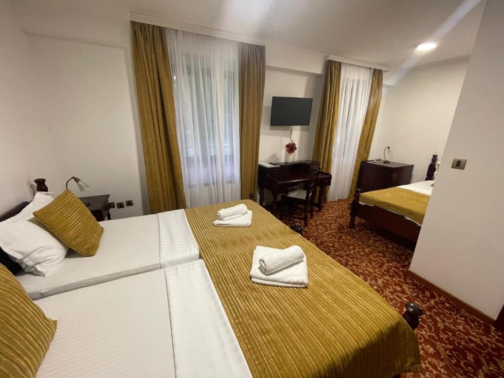 Postel nebo postele na pokoji v ubytování Grand Hotel&Restaurant