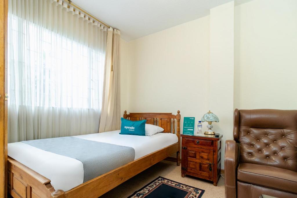Postel nebo postele na pokoji v ubytování Casa Hostal Norte