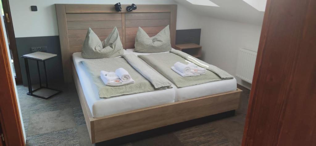 Postel nebo postele na pokoji v ubytování Pension Gemshorn