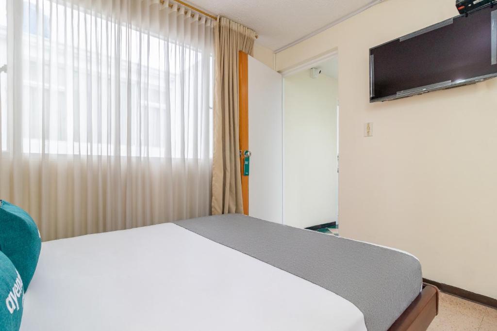 TV a/nebo společenská místnost v ubytování Casa Hostal Norte