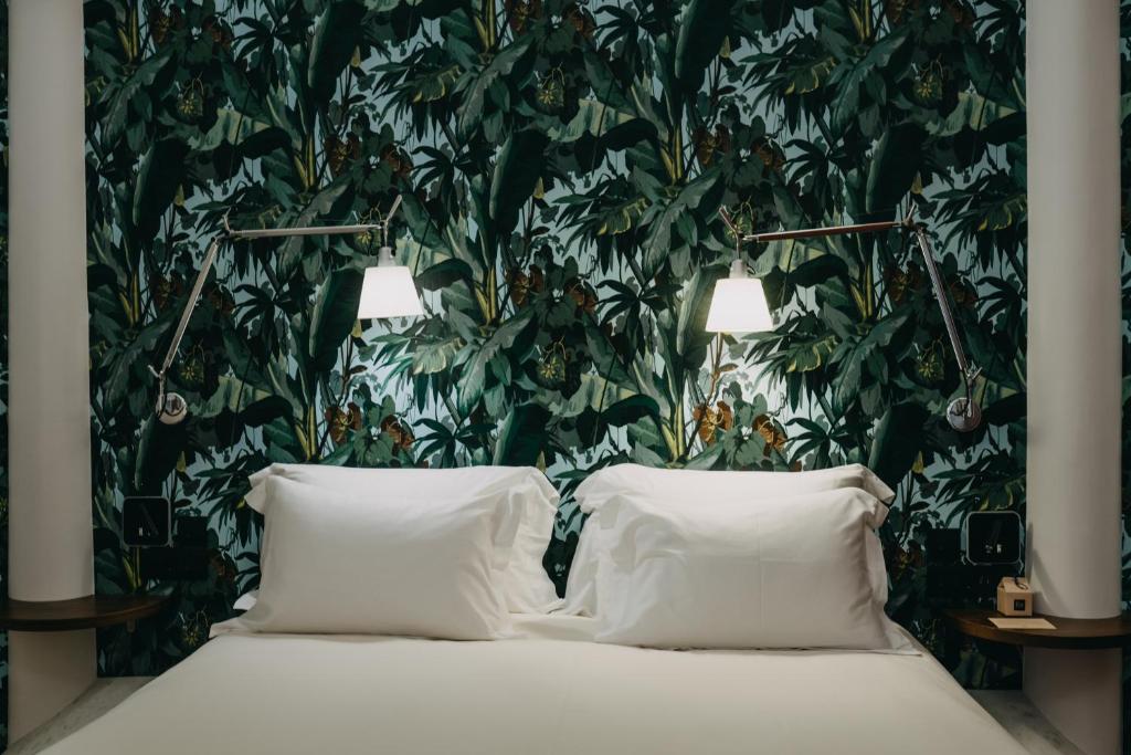 Ένα ή περισσότερα κρεβάτια σε δωμάτιο στο The Bold Type Hotel, a Member of Design Hotels