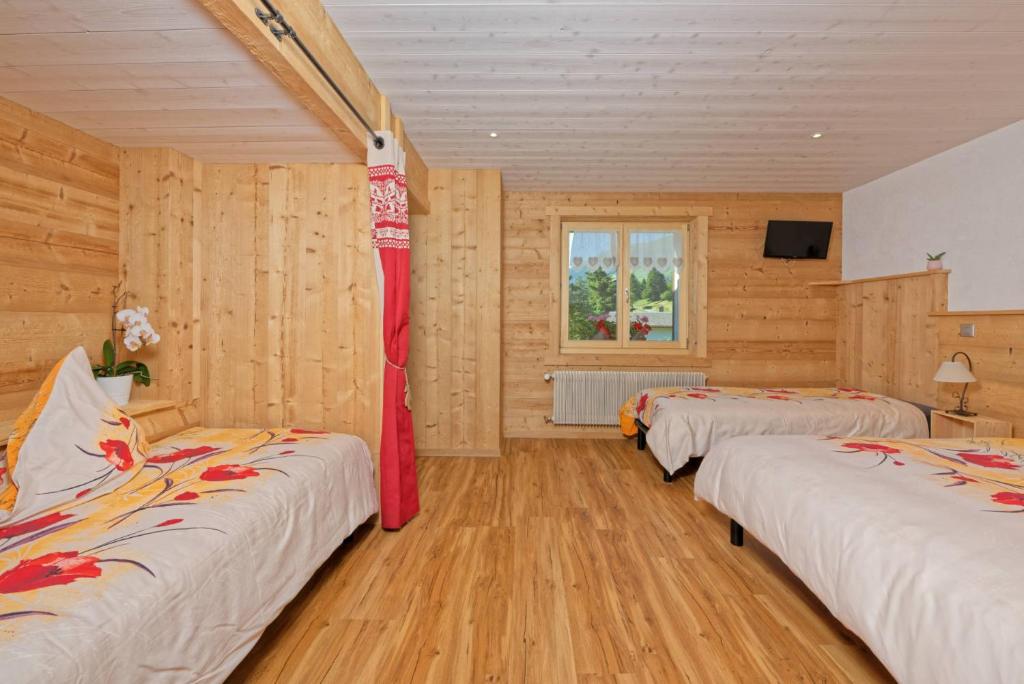 Postel nebo postele na pokoji v ubytování Au Bivouac de Napoléon et Spa