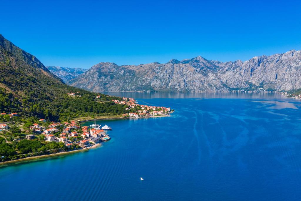 an island in the middle of a large body of water at Hotel Splendido in Kotor