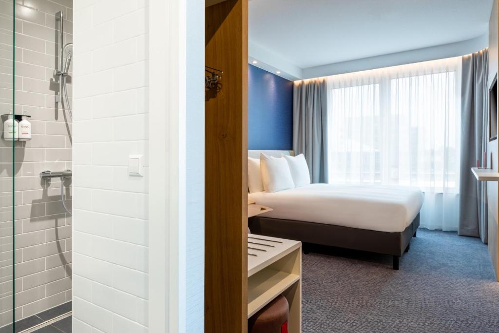 Postel nebo postele na pokoji v ubytování Holiday Inn Express - Almere by IHG