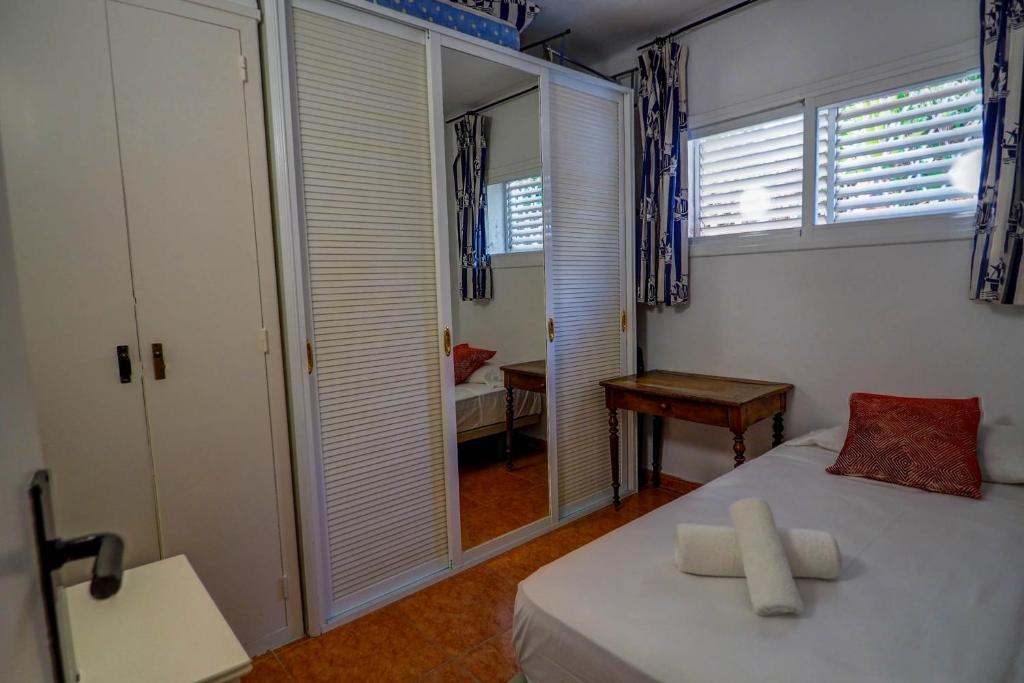Postel nebo postele na pokoji v ubytování Beach Apartment Garden Vinyet by Hello Homes Sitges