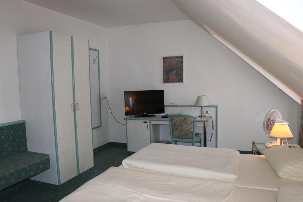TV a/nebo společenská místnost v ubytování Hotel Windfelder