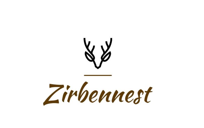 un logotipo para la sociedad de inversión ziegler en Appartments Zirbennest en Schladming