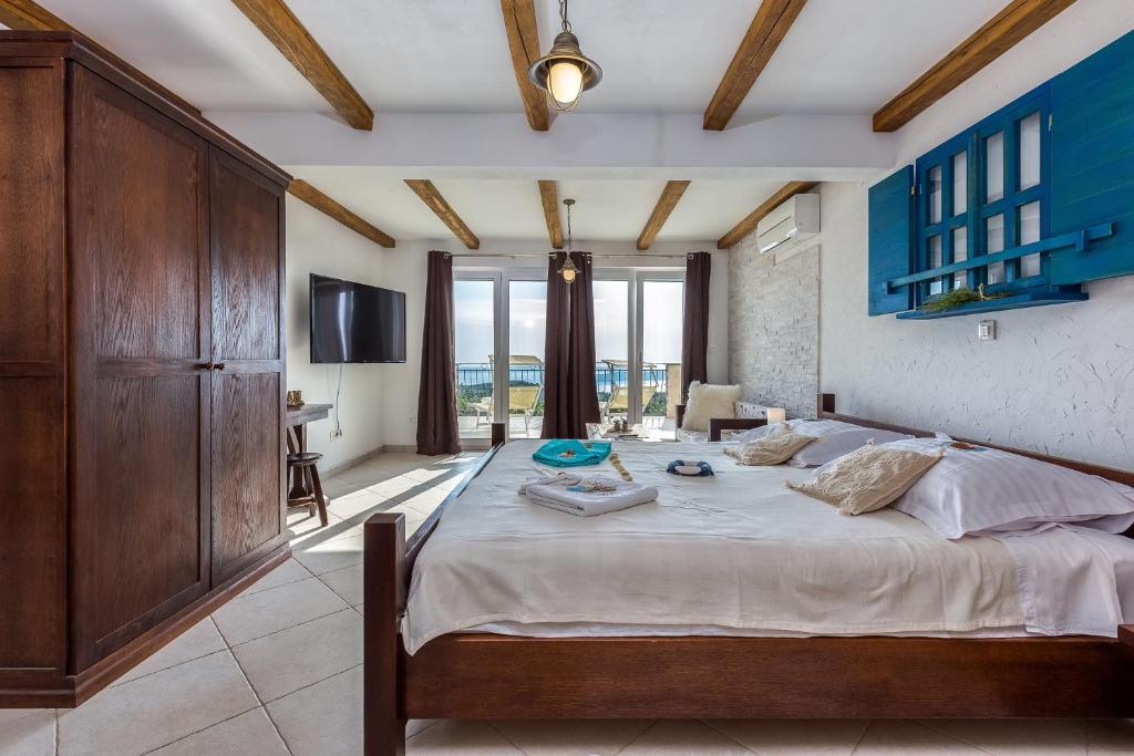 Postel nebo postele na pokoji v ubytování Lucija House - Lika Senj county