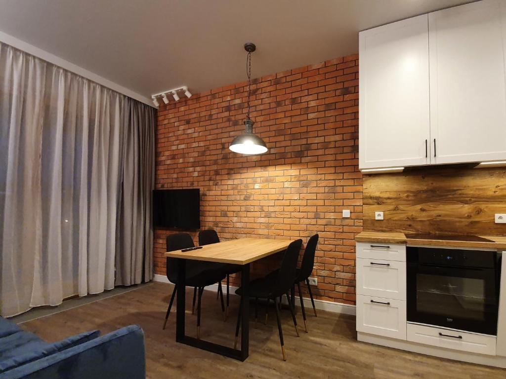 Kuchyňa alebo kuchynka v ubytovaní Chopin Apartments - City