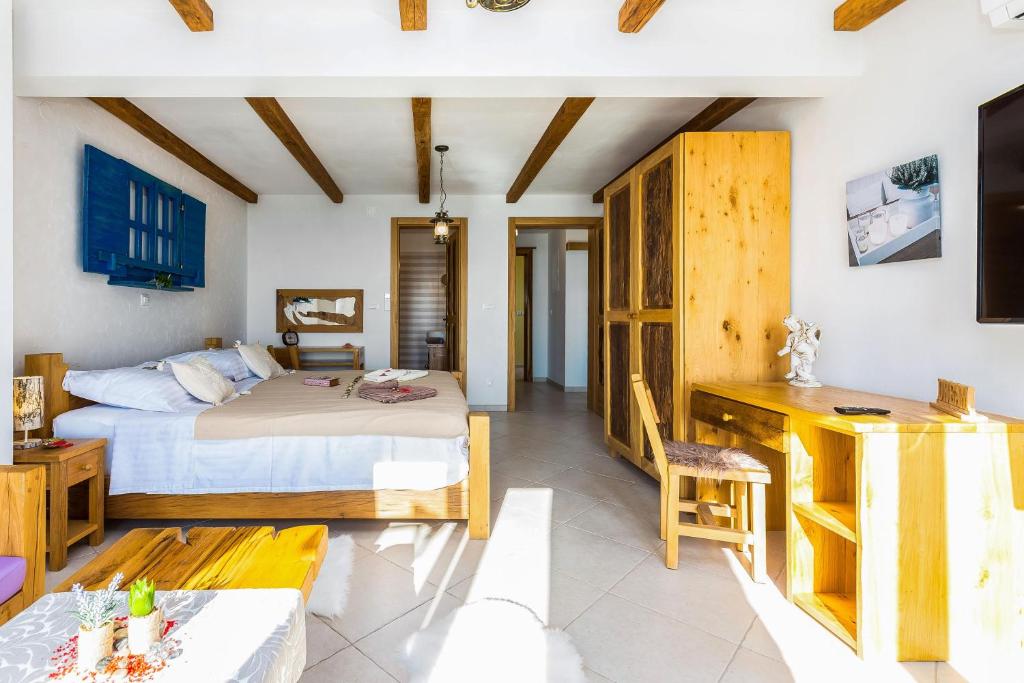 Postel nebo postele na pokoji v ubytování Lucija House - Lika Senj county