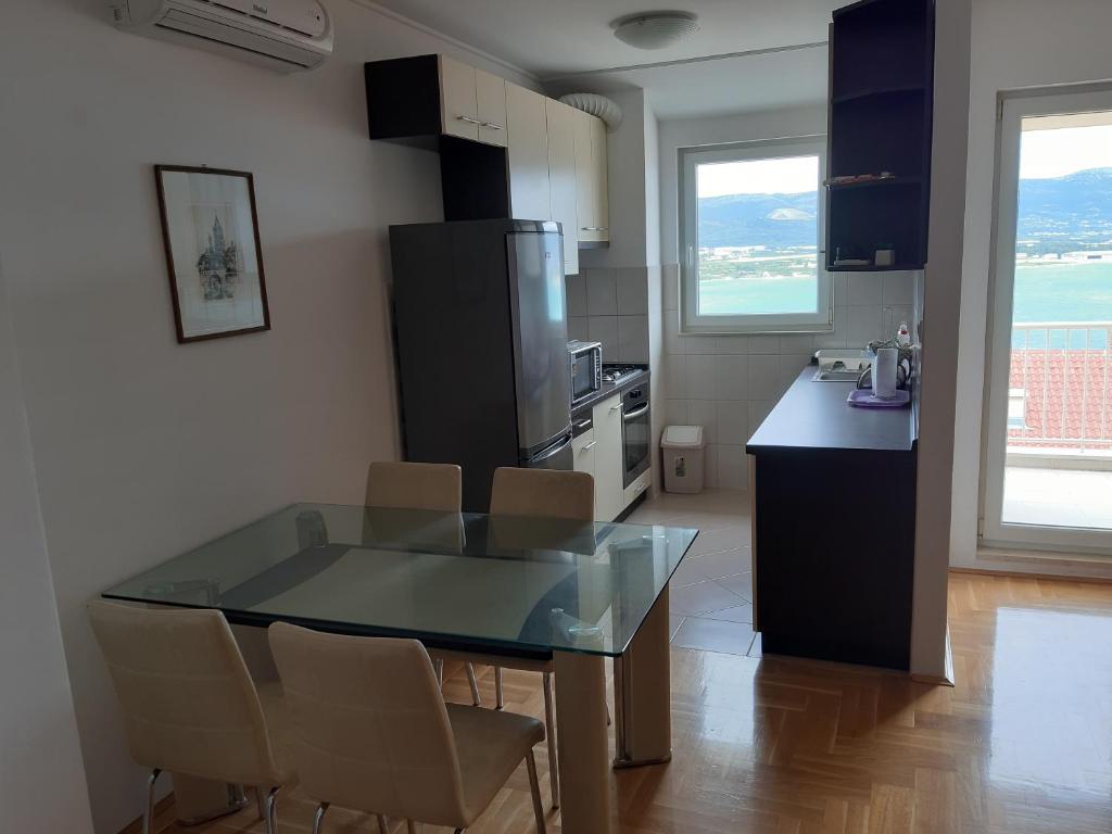 Kuchyňa alebo kuchynka v ubytovaní Apartment Quattro