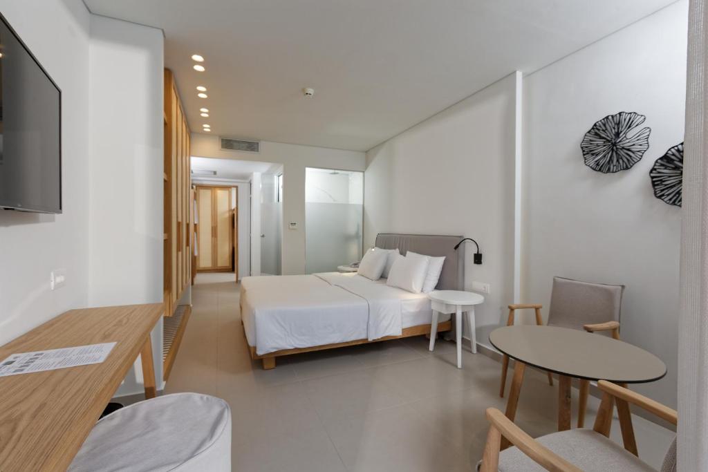 Postel nebo postele na pokoji v ubytování Anissa Beach Hotel